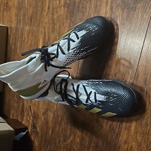 Adidas turf shoes/indoor   size 13 in men's. Black,white, and gold.